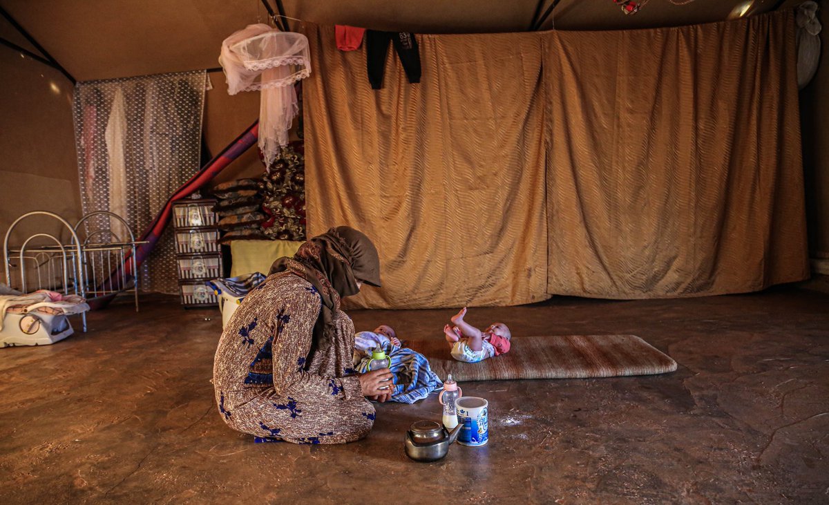 MarkCutts's tweet photo. #Syria: Winter is coming &amp; millions of displaced people in tents &amp; makeshift shelters are dreading the freezing weather ahead 

That includes people like Umm Taj &amp; her 3-month-old twins, who live in a camp in Idlib. More resources are urgently needed to assist people like this https://t.co/CLhU0DSmWv