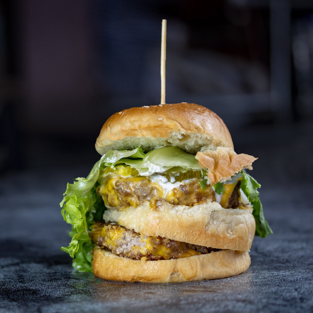 Introducing the Pig Mac. Two all pork patties, special sauce, lettuce, American cheese, pickles, and onions on a sesame seed bun from Craft Bakery Pensacola.

Why? Because it's delicious and fun.