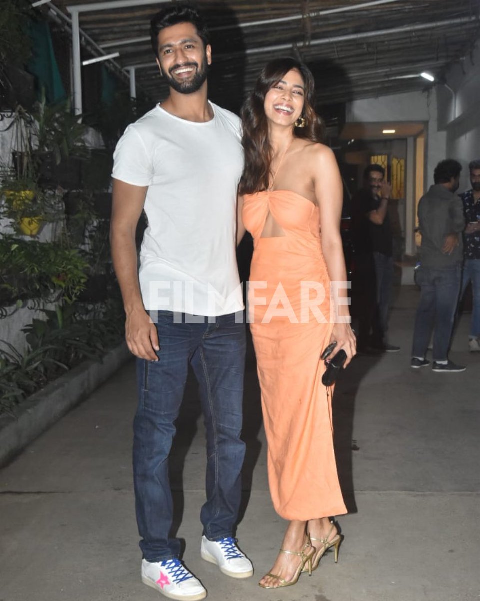 filmfare's tweet photo. #VickyKaushal and #MalavikaMohanan pose for the paps outside Sunny Super Sound in Juhu where a special screening of #SardarUdham was held. https://t.co/htxVbWSKDU