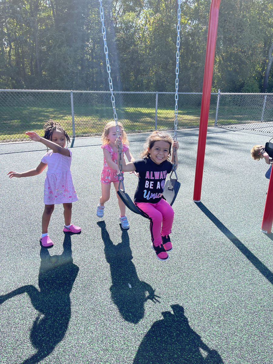 Enjoying our new softer playground surface