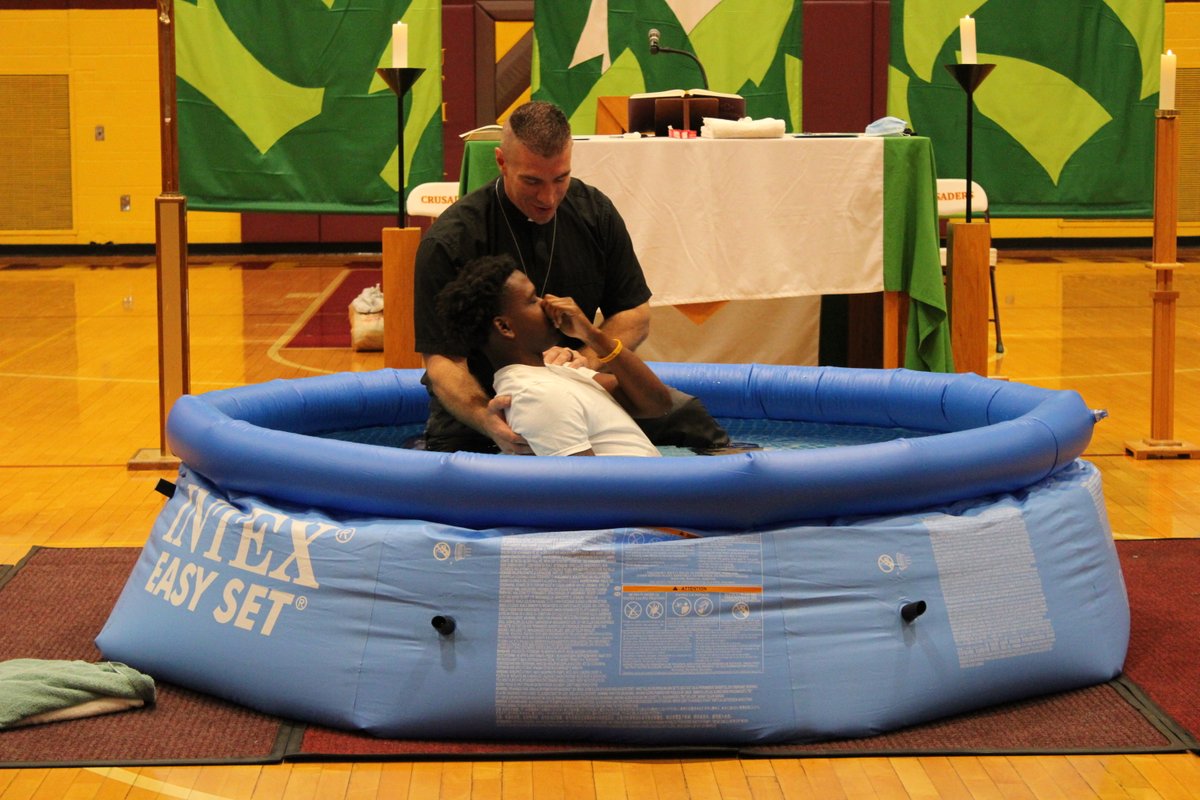 lncrusaders's tweet photo. This is what it's all about! 
Seniors Caldra Williford and Jaylin Carson were baptized at chapel in front of the entire student body and family there to support them. Rev. Mark Femmel of Zion Lutheran baptized the two football players, confirming their faith. #LuthEd https://t.co/5AQavp2NJK