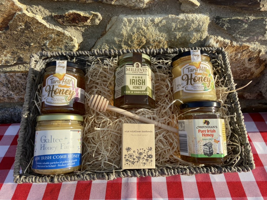 Our new and improved Honey Hamper. 5 jars of honey from 5 counties in Ireland, also the hamper includes a free honey spoon and a box of Irish native wildflower seed bombs to give back to the Irish bees. #Christmas #hampers #christmashampers #Honey #irishhoney #irishfood