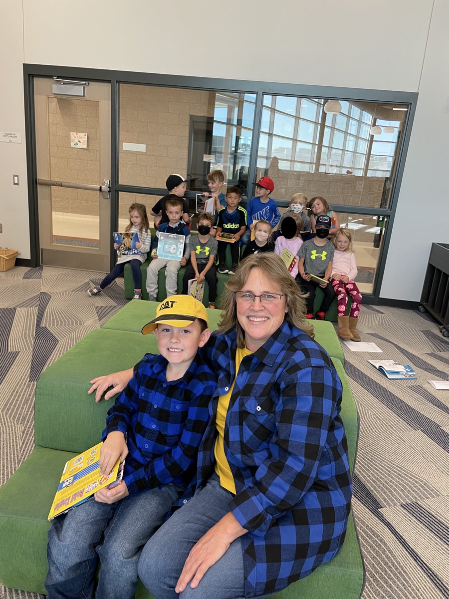 Mrs. Stanek's class was enjoying books in the Library today @DCWElementary.  We just couldn't help but take a pic of McCoy &amp; Mrs. Jensen twinning today.  Too cute!  <a href="/DCWestFalcons/">DCWest Falcons</a>