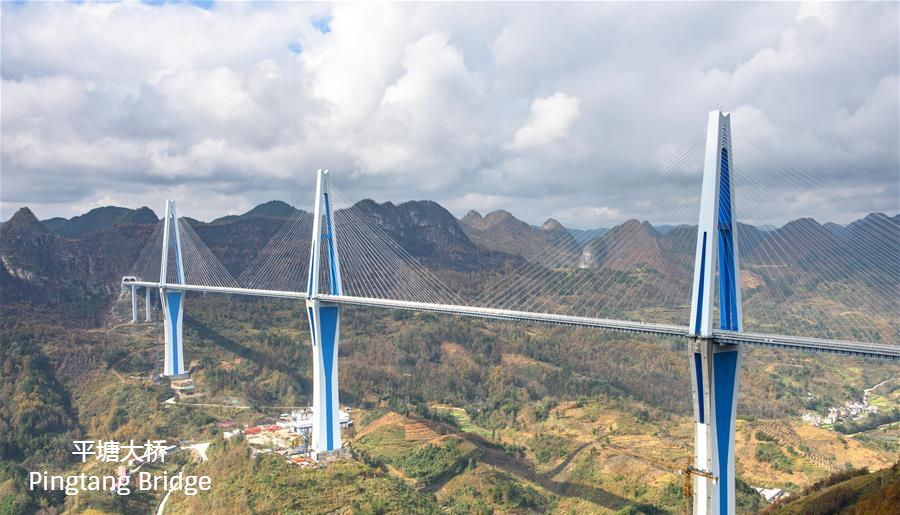 AmbQinGang's tweet photo. 一桥飞架南北，天堑变通途 
A bridge flies to span the north and south, turning a deep chasm into a thoroughfare. #SustainableTransport https://t.co/HldFM8Fkge
