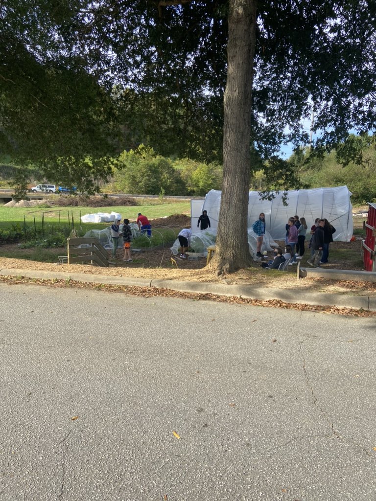 Gina4Lit's tweet photo. Middle school students are composting their lunch trays, using the compost to grow food in Science and caring for chickens. The high school entranceway and parts of the new culinary classroom were built by the students. #tappingintotalent #NCTOYPOY https://t.co/rICPwymYI9