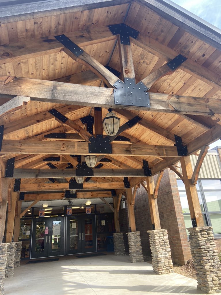 Gina4Lit's tweet photo. Middle school students are composting their lunch trays, using the compost to grow food in Science and caring for chickens. The high school entranceway and parts of the new culinary classroom were built by the students. #tappingintotalent #NCTOYPOY https://t.co/rICPwymYI9