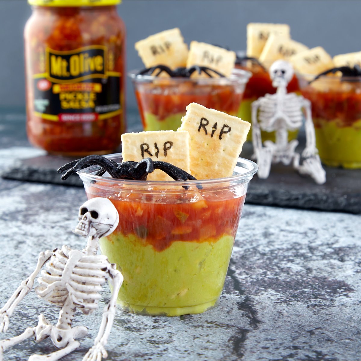 MtOlivePickles's tweet photo. 🕷️ Halloween is right around the corner! 🎃 Would you try this #SPOOKYSNACK, Salsa &amp; Guacamole Tombstone Cups? 💀 Made with #PICKLESALSA!

Click here for the recipe: https://t.co/7mcQ9zlXVZ

#HalloweenSnacks #SpookySnacks #KidsSnacks #HalloweenParty #HalloweenSnack #HalloweenFood https://t.co/3VjV76arqw
