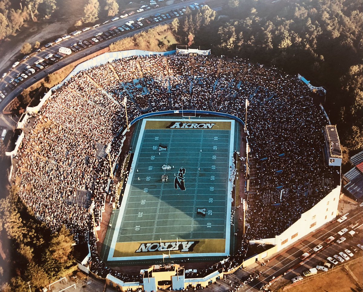 With an exciting win for Akron football this past weekend, we want to #throwback  to the 1980’s with this aerial shot of the Rubber Bowl - where UA played for nearly 7 decades! 💙🏈💛 What memories do you have of the Rubber Bowl? #TBT