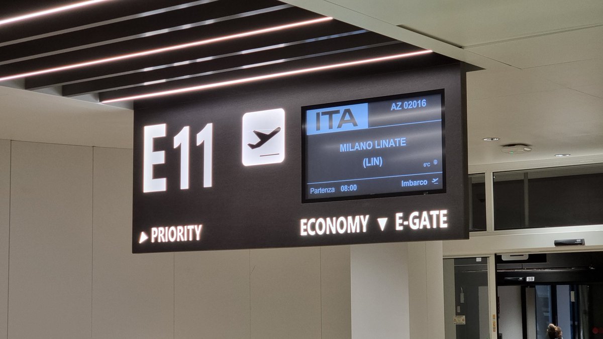 SpieleWERT's tweet photo. ITA's first flight from Rome Fiumicino is boarding. #AZ2016
The sign says ITA, but the speakers say Alitalia. On launch day the airline is still having an identity crisis. #Alitalia https://t.co/fC2zPUGvy9