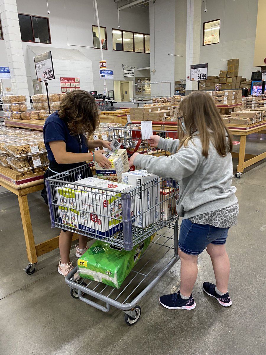 mswegener's tweet photo. Ss shop for supplies for the McCawfee Cart. They practiced comparison shopping, dollaring up, scanning items to find prices &amp; locating items from their lists. @AmesChiefs @_pdepalma https://t.co/q0J6qGE2Ik
