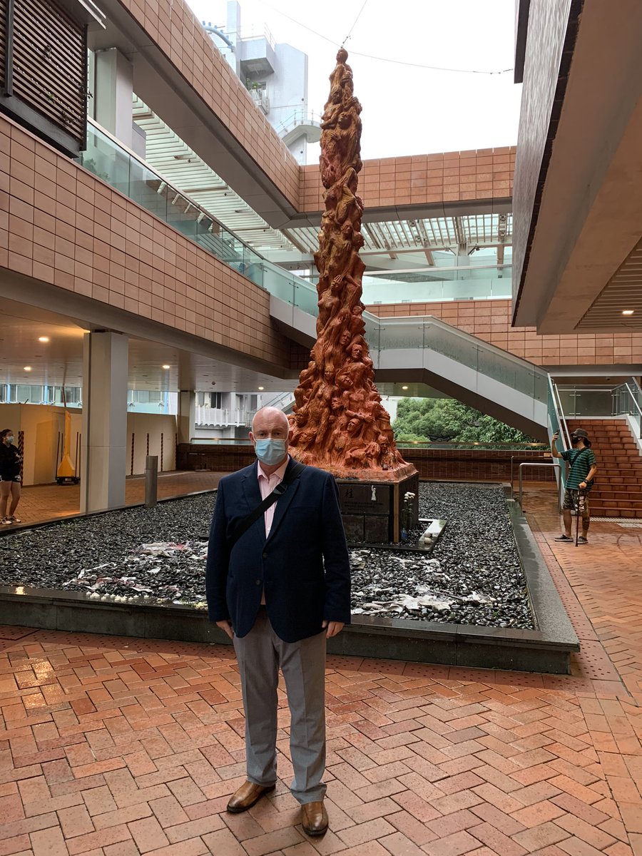 dmacostello's tweet photo. The @HKUniversity has literally grown around #Denmark’s @Galschiot sculpture #PillarOfShame which has occupied this site for the past 24 years!  Poignant to witness the constant flow of #HongKongers to the pillar since the announcement of its imminent removal. #Art #History https://t.co/gFZmAEcv0U