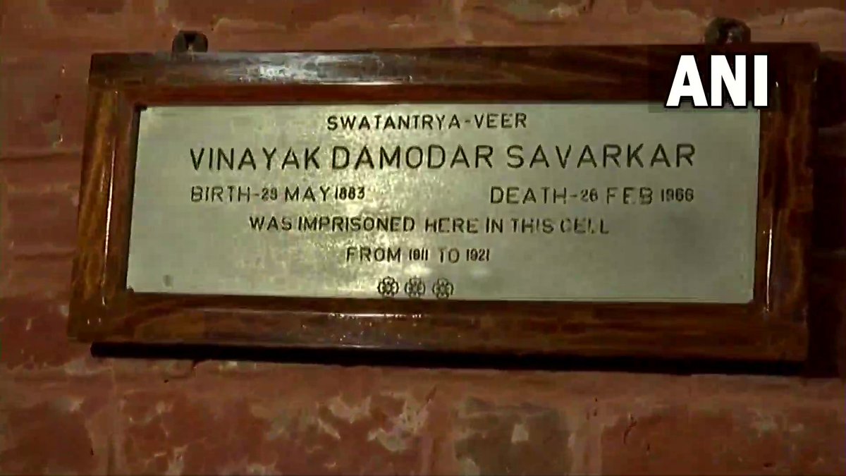 ANI's tweet photo. Andaman and Nicobar Islands: Union Home Minister Amit Shah visits the cell where Vinayak Damodar Savarkar was imprisoned at Cellular Jail in Port Blair. https://t.co/vJnJ4vcWAL