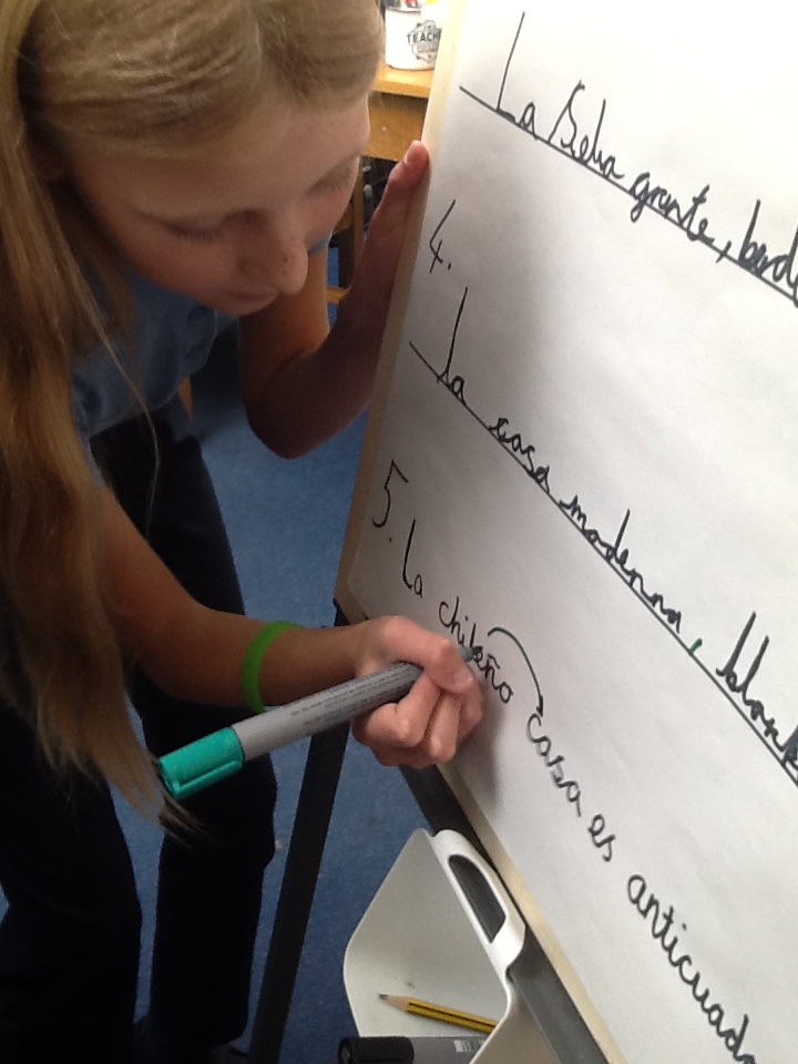 RiseParkSchool's tweet photo. Year 5- This week, Quinto Grado have been completing self and peer assessment of their writing on expanded noun phrases describing houses in Spanish. Here they are looking out for wonky word order and adjectives matching nouns! https://t.co/uIka7p1COc