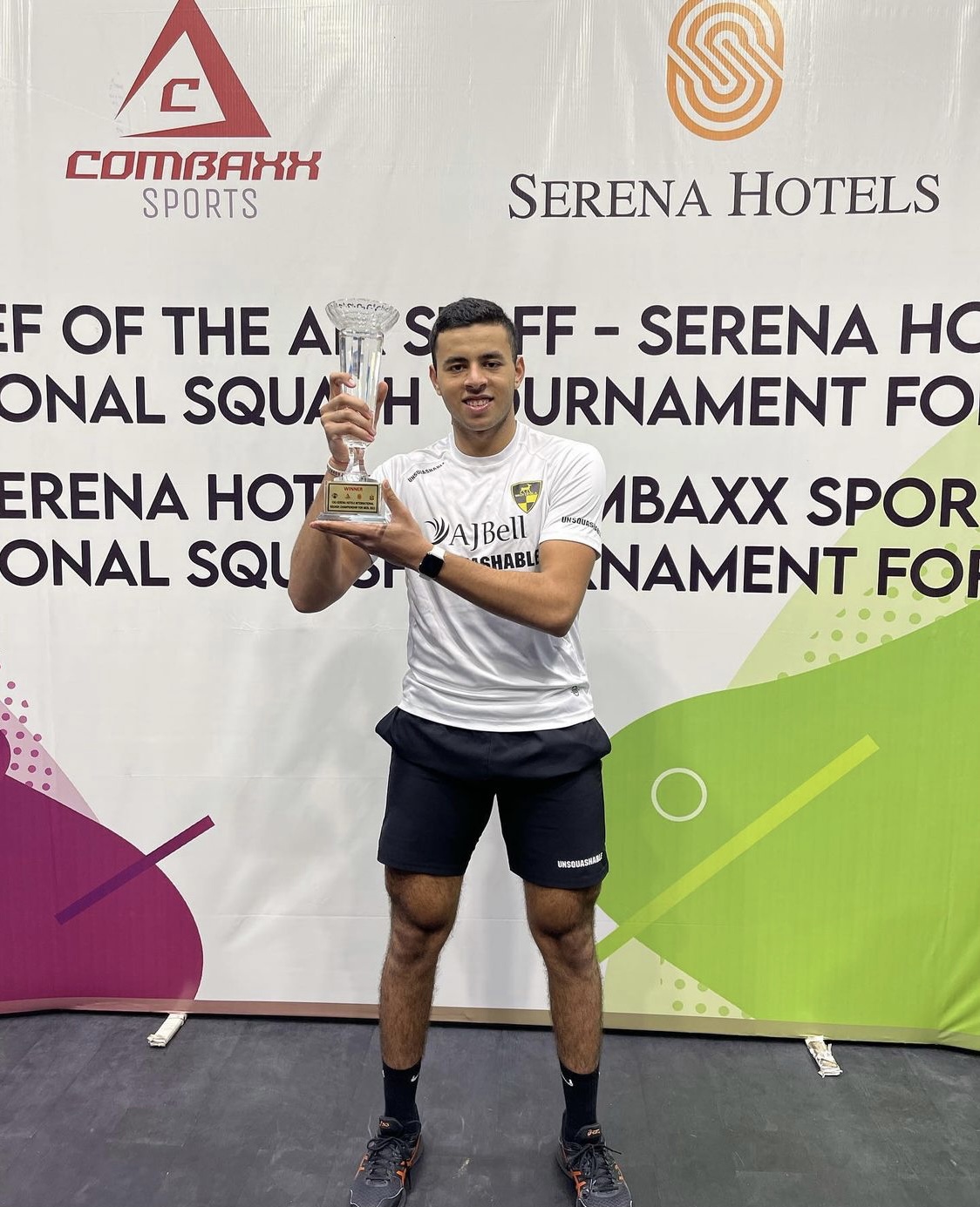 Moustafa El Sirty with the trophy