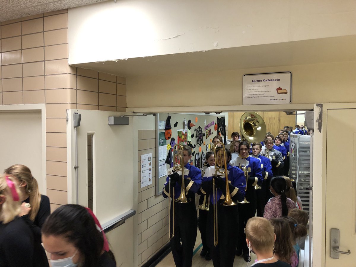 BHS band members arrived at WES. What a nice surprise visit during lunch for the kids &amp; staff today!