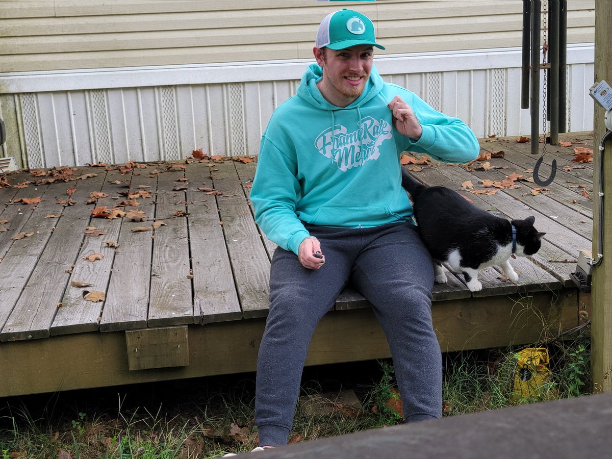 TwigjaT's tweet photo. A story in 4 pictures. Because it's Animal Crossing Direct day and ALSO it's #FrameRateFriday, I thought I'd take some pictures with my favorite hoodie from @FrameRateMerch! Doogie the cat decided to be a part of it also 🥺🙏 https://t.co/MSJuUtWTjB