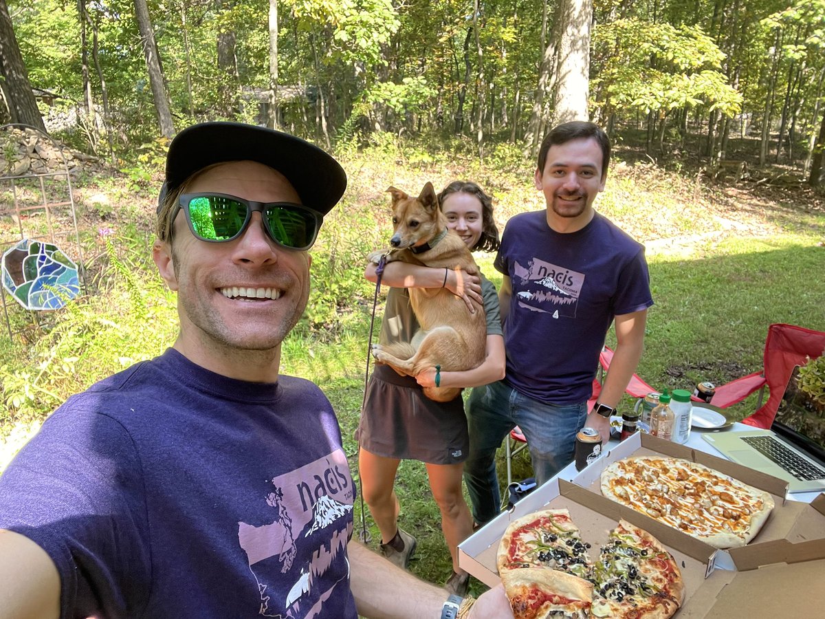 jimeynard's tweet photo. #nacis2021 watch party in Harpers Ferry, WV, with Becca and @Carto_ALex and Frankie dog who seems to be more interested in squirrels than the talks, very rude. Also, matching shirts https://t.co/jaoTGBuCVv