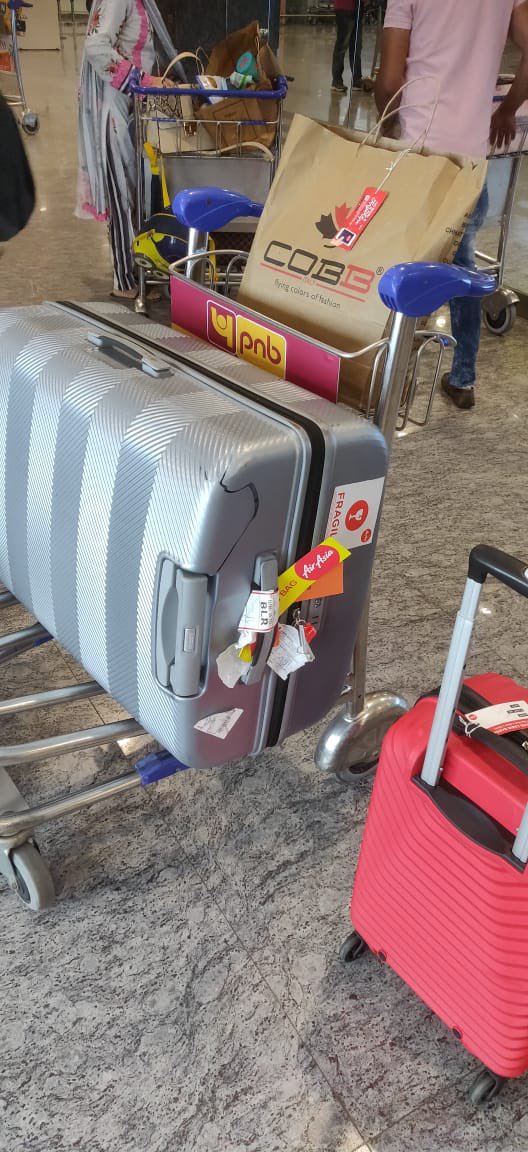 abkaria's tweet photo. @AirAsiaIndia first you ask money for priority checkin, then you put this Fragile tag on our baggage just so that it is “handled with care” and then this happens! #AirAsiaSucks Your support team and ground staff is of no help! https://t.co/vpffecU68A
