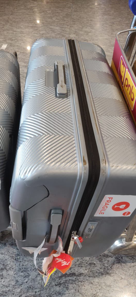 abkaria's tweet photo. @AirAsiaIndia first you ask money for priority checkin, then you put this Fragile tag on our baggage just so that it is “handled with care” and then this happens! #AirAsiaSucks Your support team and ground staff is of no help! https://t.co/vpffecU68A