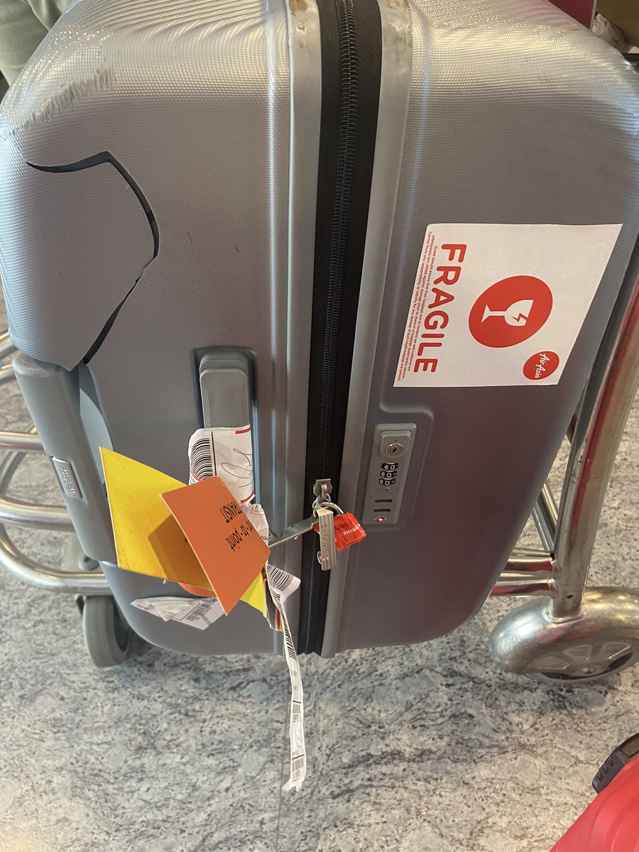 abkaria's tweet photo. @AirAsiaIndia first you ask money for priority checkin, then you put this Fragile tag on our baggage just so that it is “handled with care” and then this happens! #AirAsiaSucks Your support team and ground staff is of no help! https://t.co/vpffecU68A