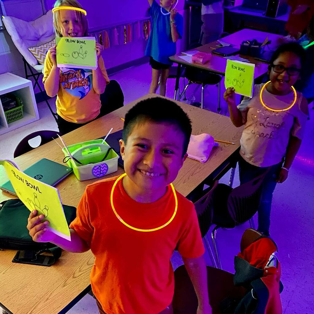 LakeParkElem's tweet photo. Glow Bowl Day in 2nd Grade: Can reviewing place value get any more fun than doing it with glow bowling? Mrs. Sheffer’s students had a blast! #learningatlpe https://t.co/BpLHKx3ucb https://t.co/BcFafV9JJR