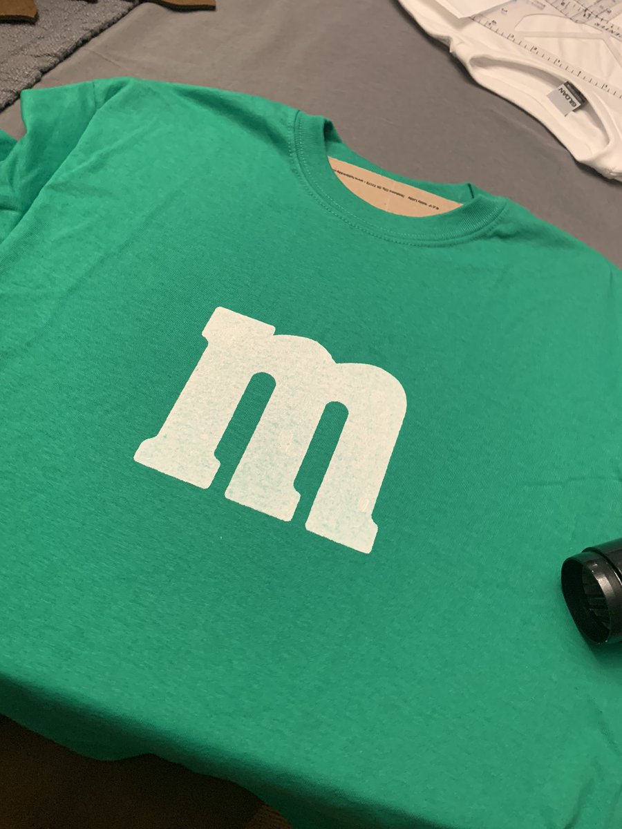 JayKondrk77's tweet photo. Back to the screen game 🎨 got volunteered for some gymnastics stuff. If you’re gonna be an M&M you might as well be the green one right? #photoemulsion #screenprinting gonna try and add sparkle to paint go multi color too. Guess we’ll see https://t.co/h6YMavgd7Q