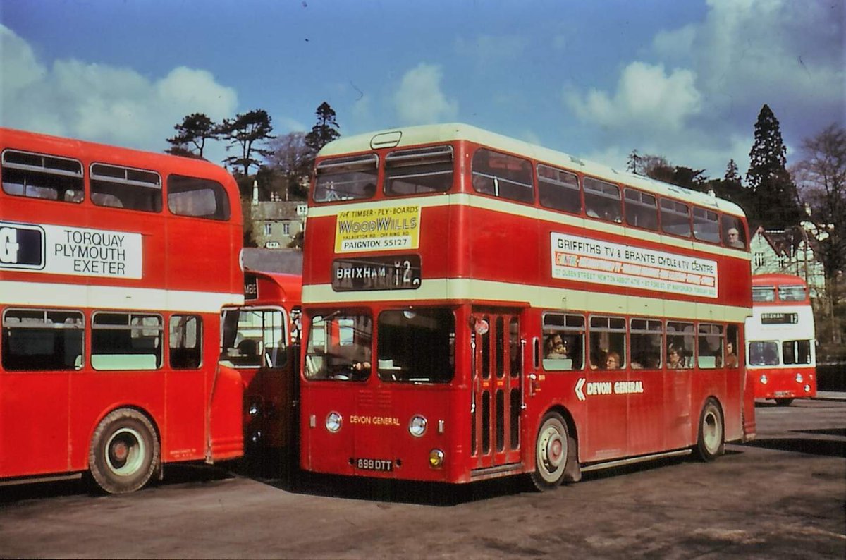 devongeneralso1's tweet image. Sporting a combination of traditional and NBC-style fleetnames, Roe-bodied Leyland Atlantean 899 DTT (899) is seen here at Newton Abbot Bus Stn. Behind, a Sea Dog Atlantean is just arriving to form the next Service 12 departure to Brixham.
Picture credit: Rod Northcott collection