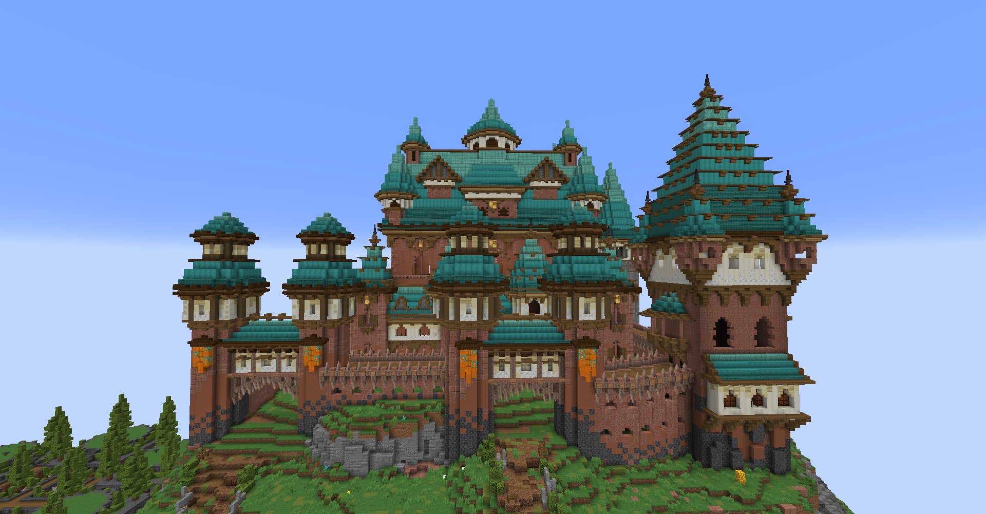 Remade a castle I built in minecraft classic! Second photo is the