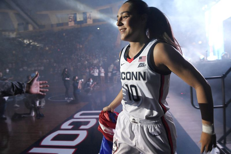 Johnnystill1's tweet photo. @UConnWBB Connecticut's Nika Muhl is introduced during UConn's 2021 First Night celebration, Gampel was absolutely rocking Friday night during UConn’s annual First Night as the 2021-22 UConn WBB was introduced to a students-only crowd that was essentially SRO https://t.co/KGBkzp5CKA