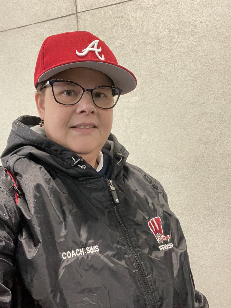 Let’s go Braves and Cats!  Using my coaching parka to stay dry as I wait to go into Game 4.