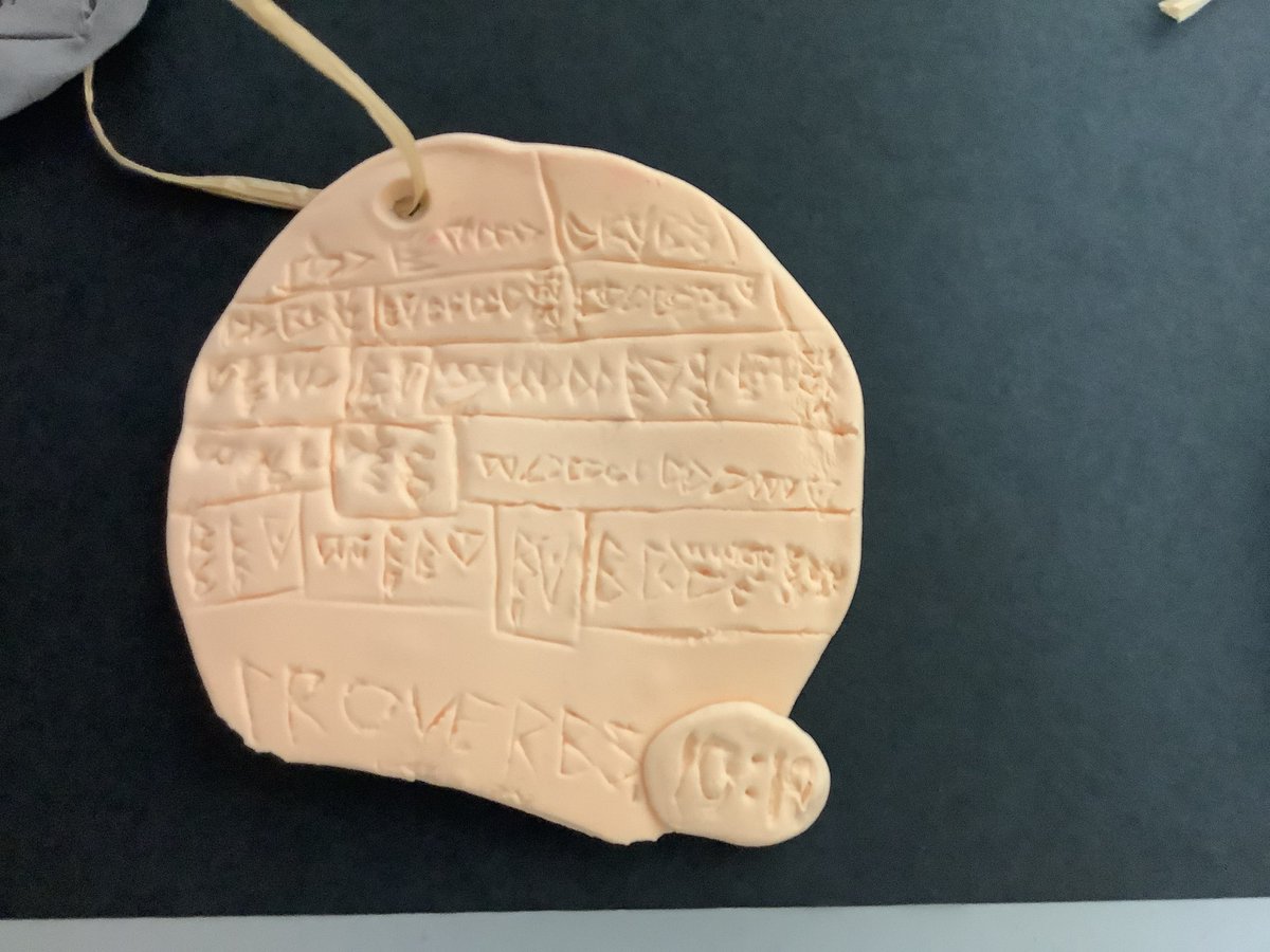 naschoolupdates's tweet image. Sixth grade social studies students at NAMS have been studying Sumerians and their invention of the first writing, cuneiform. Students have made clay " tablets" with a favorite inspirational message written in cuneiform.