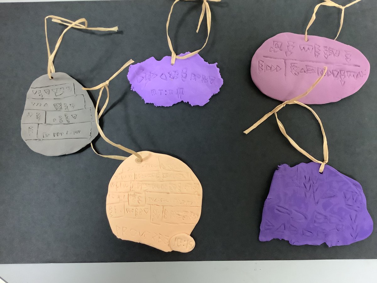 naschoolupdates's tweet image. Sixth grade social studies students at NAMS have been studying Sumerians and their invention of the first writing, cuneiform. Students have made clay " tablets" with a favorite inspirational message written in cuneiform.