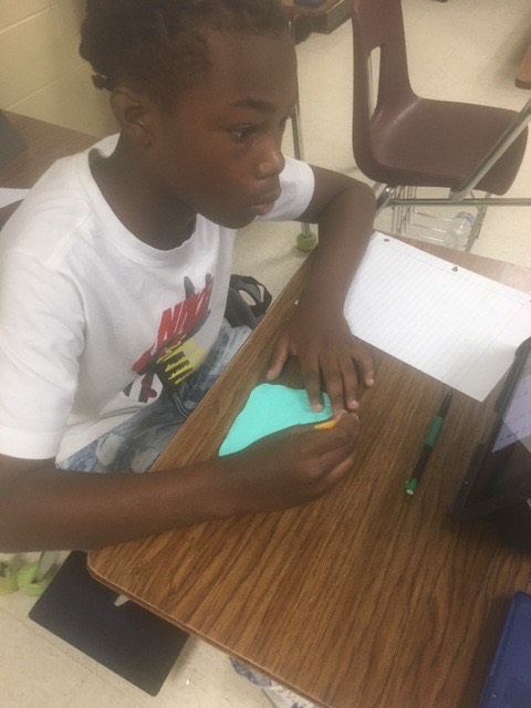naschoolupdates's tweet image. Sixth grade social studies students at NAMS have been studying Sumerians and their invention of the first writing, cuneiform. Students have made clay " tablets" with a favorite inspirational message written in cuneiform.