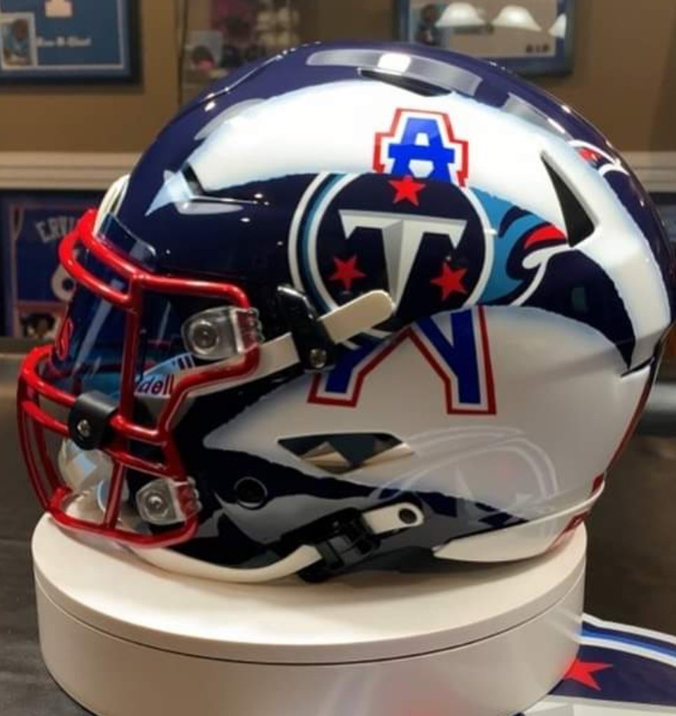 FB_Helmet_Guy's tweet photo. Titans and Oilers ripped helmet. https://t.co/UuYPKM6gMP