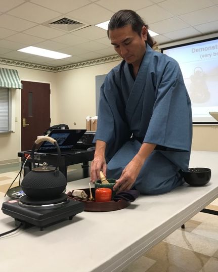 EtownCollege's tweet photo. Associate Professor of Japanese Nobuaki Takahashi gave a demonstration on the traditional Japanese Tea Ceremony to the Women's Club in Lititz last week! Takahashi has been practicing the tradition since 2017, which involves 88 procedures in serving tea. https://t.co/pg8pj8XvcO