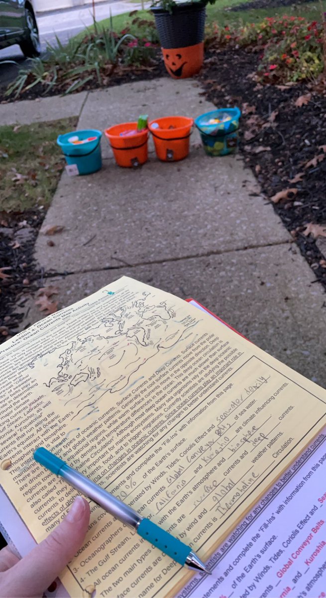 FedScience's tweet photo. Spending the evening giving out some candy while also grading papers 😆 https://t.co/dyG8Rd6cL7