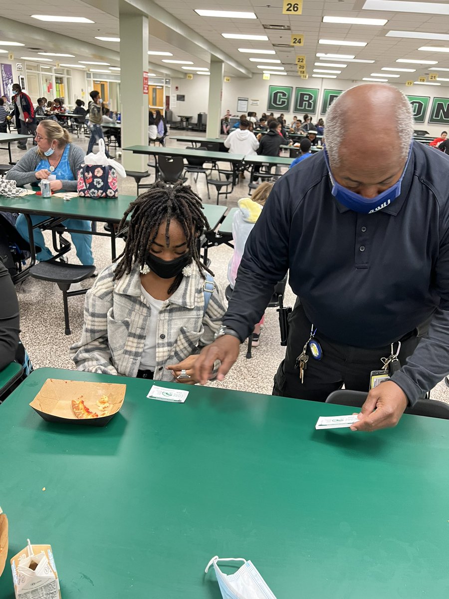 Two of our very own 6th graders earned the privilege of shadowing Mrs. Hanberg today…we might have aspiring school counselors on our hands + Officer Hyde passes out CORE Cash to students modeling excellence in the cafe! #WarrenWill