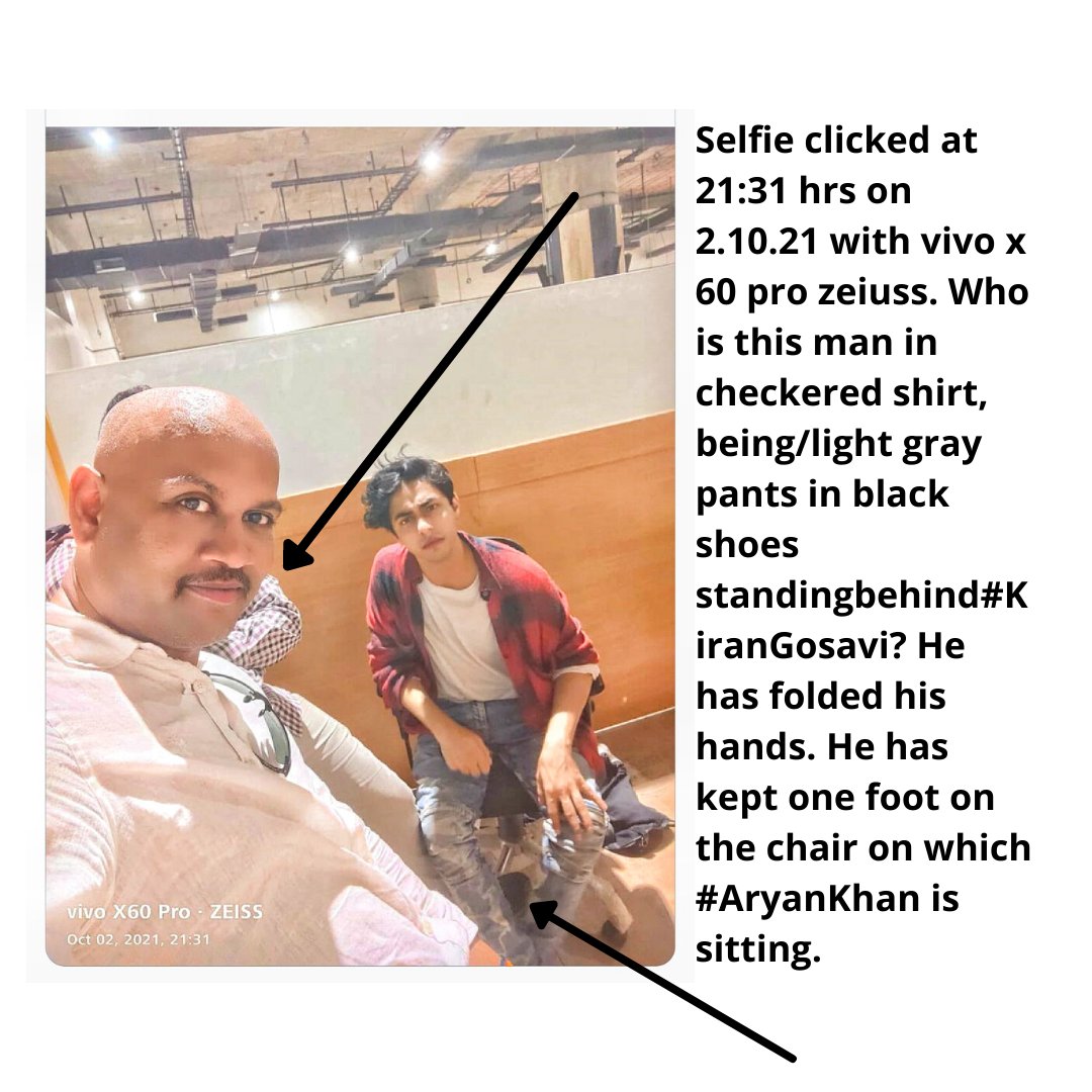 jayant_kanishk's tweet image. Selfie clicked at 21:31 hrs on 2.10.21 with vivoX60proZeiuss. Who is this man in checkered shirt, being/light gray pants in black shoes standing behind#KiranGosavi? Has folded his hands and kept one foot on the chair on which #AryanKhan is sitting. #OrganizedCrimeSyndicate