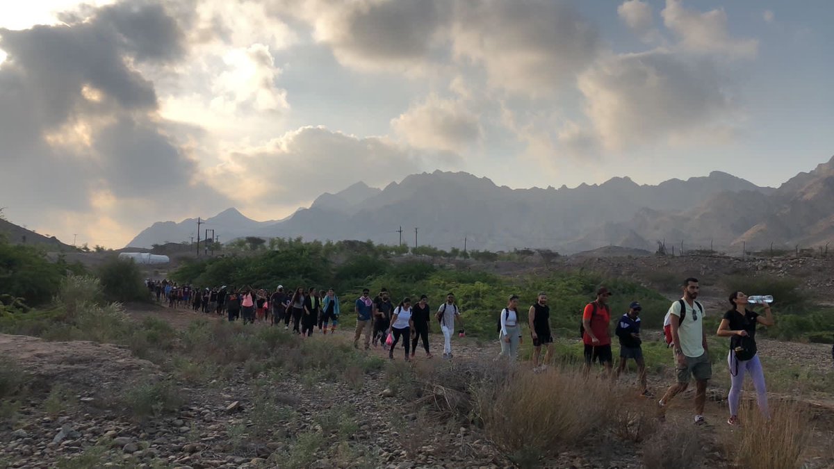 DubaiPoliceHQ's tweet photo. Joined by 200 participants of different ages and nationalities, Dubai Police community-based initiative ‘Positive Spirit’  in partnership with NAVY DXB fitness club, takes the @DXBFitChallenge and completes a five-hour hike across Hatta Hub mountains
#dubai30X30 https://t.co/STlRnes8DO