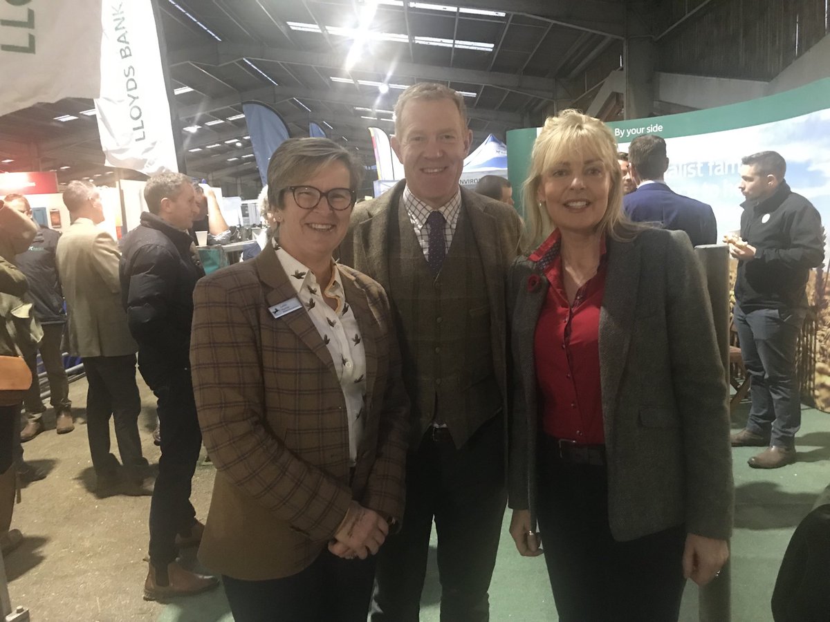 StephRyderPLS's tweet photo. #AgriExpo busy already. Plenty going on. Grabbed a pic with Adam Henson on #lloyds stand with the marvellous Judith Hunter. Farmers Guardian team ready to go. #FarmingCan #Farm24 https://t.co/cIqofNFPi7