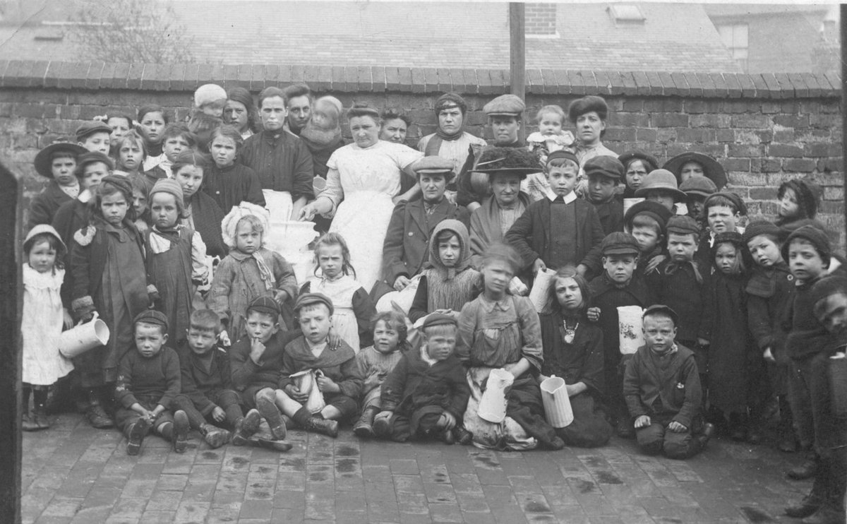 DerbyshireDRO's tweet photo. The 1912 Coal Strike was started by Derbyshire miners who wanted a set minimum wage. Their families faced hardship; here are images of mining families in Ilkeston during the strike, including being provided for by a local soup kitchen. Credit to A P Knighton 1/2
 #miningtheseams https://t.co/z6PFQwrNK5