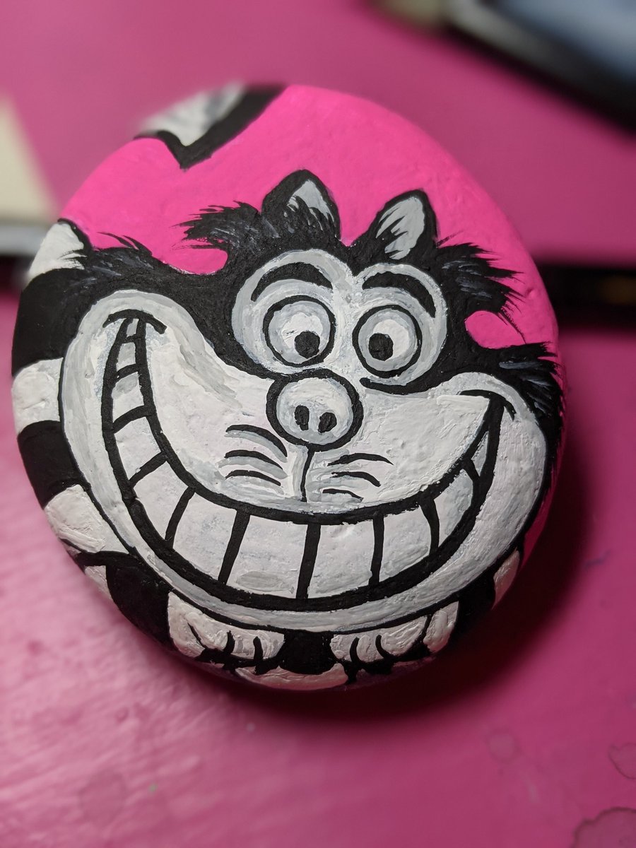 aPaintedRock's tweet photo. A different sort of Cheshire #paintedrocks https://t.co/69JzuXVx1T