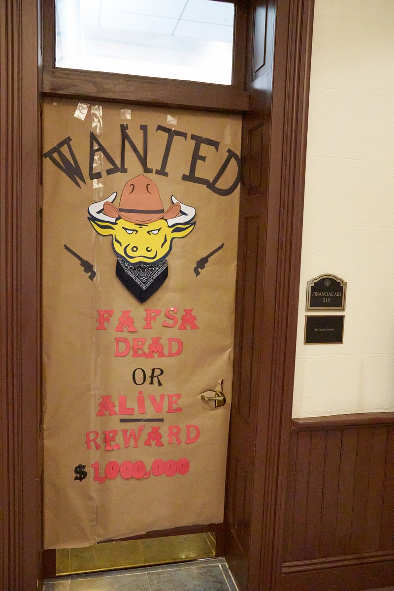 JCSUniversity's tweet photo. Our judges have started looking at doors for the #RoundUp1867 Door Decoration contest and we love what we see so far! Loving these creative entries. We'll let you know who wins later today! #JCSU https://t.co/4mUW4Xp5WZ
