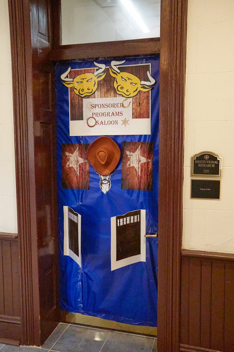 JCSUniversity's tweet photo. Our judges have started looking at doors for the #RoundUp1867 Door Decoration contest and we love what we see so far! Loving these creative entries. We'll let you know who wins later today! #JCSU https://t.co/4mUW4Xp5WZ