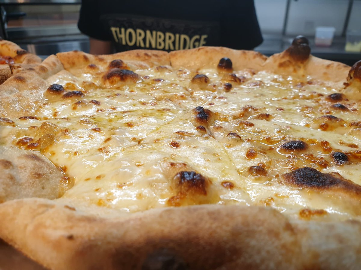Don't forget our amazing pizza kitchen is open until 9pm tonight! Who is in for a garlic bread with cheese? Well the dough is made from @thornbridge beer, as you lot well know 😋 #Pizza #pizzatime #beer #FridayVibes