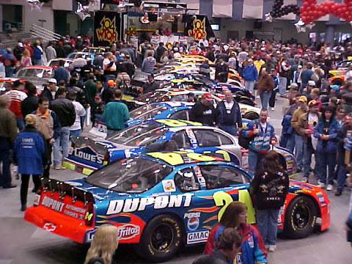 RacingPast's tweet photo. The crowd gathers around during the annual Wayne Robertson NASCAR Winston Cup Series preview event in 2002. https://t.co/94d38ZRsNW
