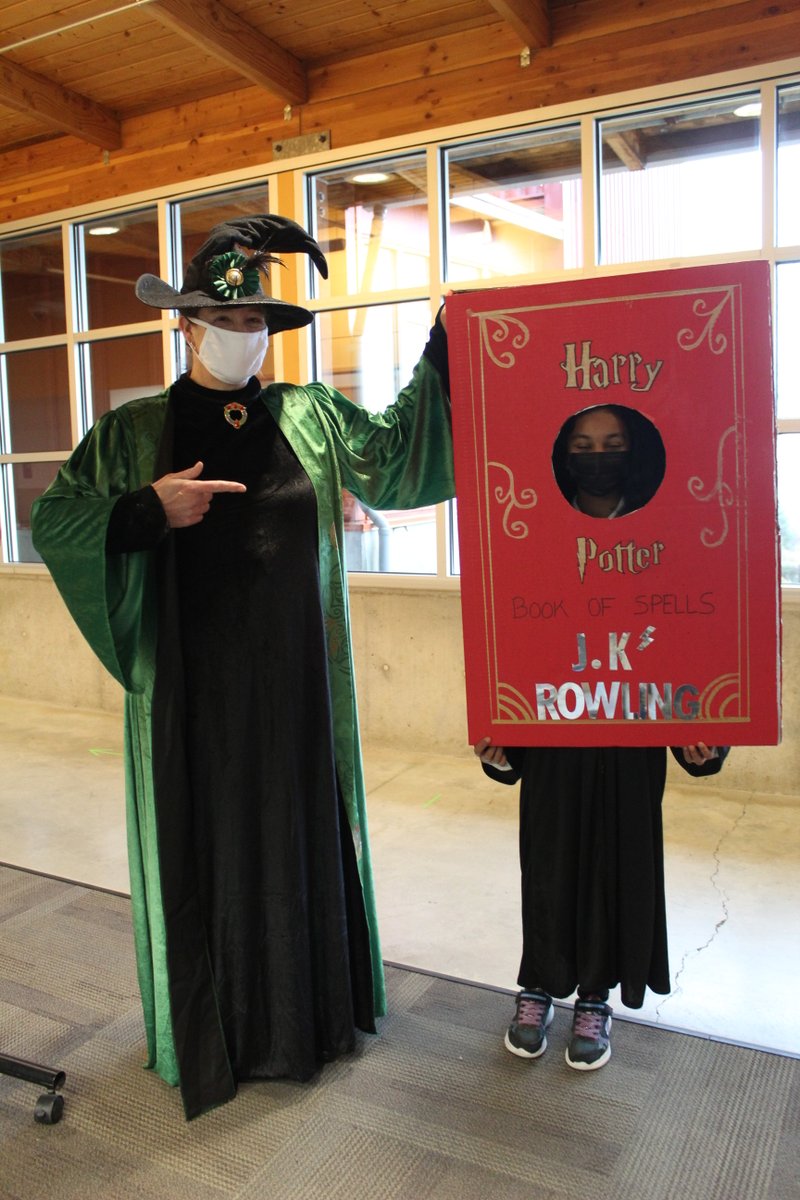 OWSBobcat's tweet photo. Ms. Christensen and her Book of Spells. #OWSSpiritWeek https://t.co/6LUStqicHm