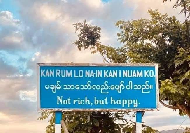 LoveSWAN7's tweet photo. The greeting sign of #Thantlang where God-fearing #chin ppl once lived: NOT RICH BUT HAPPY! I saw a fb post where OP said that God gave them their home at 2002 and took it back at 2021 and thanking God for letting them live in their home for 20 years.

#WhatsHappeninglnMyanmar https://t.co/o3FRxmwKSP