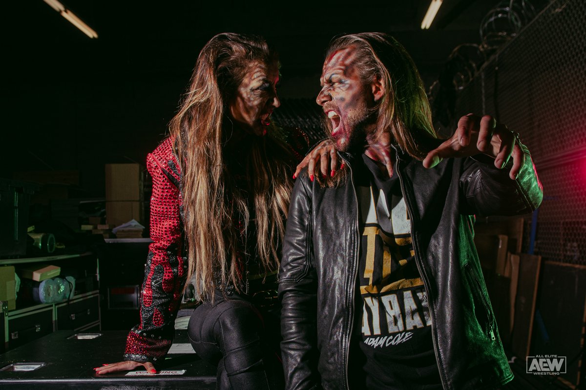 AEW's tweet photo. Scary story time with Adam Cole, BAY BAY! 🧟‍♂️ 
@AdamColePro #Halloween Photo Gallery: https://t.co/mGoKSQ9yhf
w/ @RealBrittBaker: https://t.co/UQpPjAMemv https://t.co/yiAIQkwl4y