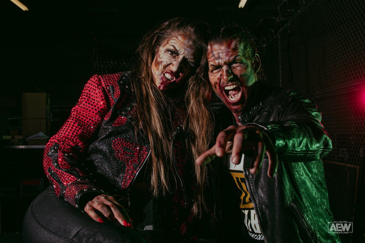 AEW's tweet photo. Scary story time with Adam Cole, BAY BAY! 🧟‍♂️ 
@AdamColePro #Halloween Photo Gallery: https://t.co/mGoKSQ9yhf
w/ @RealBrittBaker: https://t.co/UQpPjAMemv https://t.co/yiAIQkwl4y